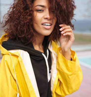 amazing-african-curly-young-woman-wearing-yellow-PCUMRSX-unsplash-scaled.jpg